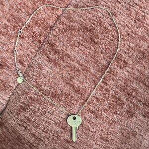 Giving Key “Strong” Gold Pendant Necklace